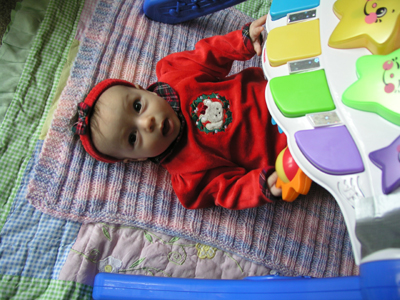 Alexandra likes her toys!