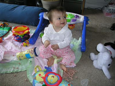 Alexandra is eating baby food