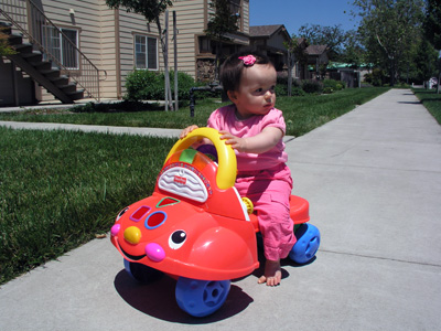 Alexandra is driving her aoutomobil